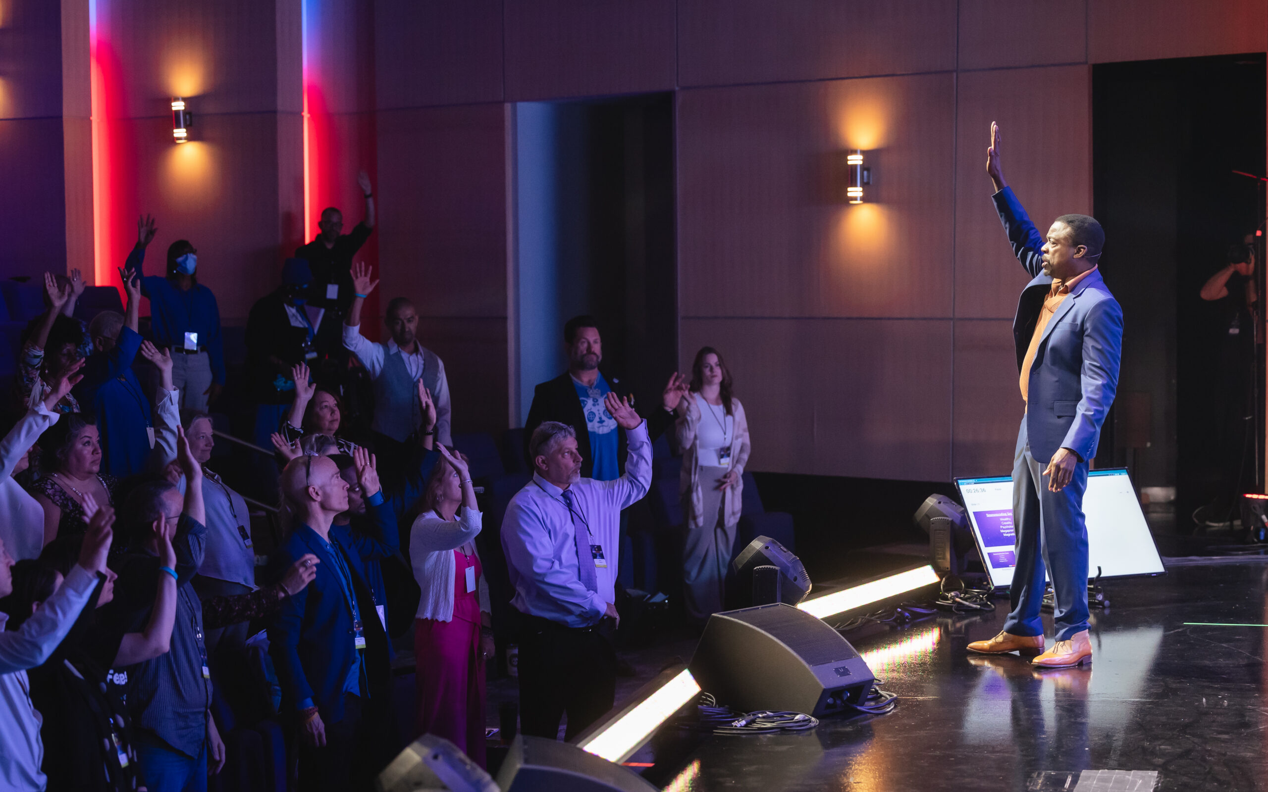 Joseph McClendon III teaching from stage